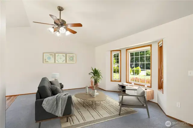 Spacious living room. Carpet is new.   Photo is virtually staged.