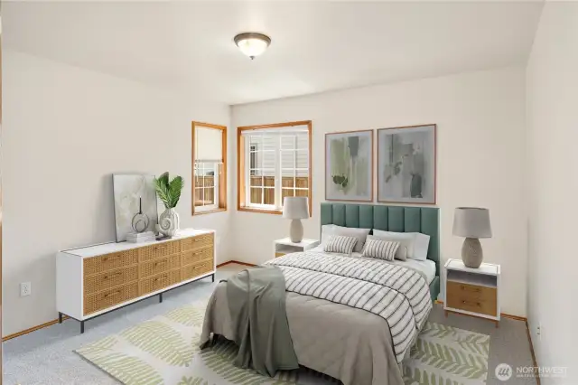Generous Primary Suite Featuring an En-Suite Bathroom & Walk-In Closet – Your Private Retreat Awaits! Photo is virtually staged.