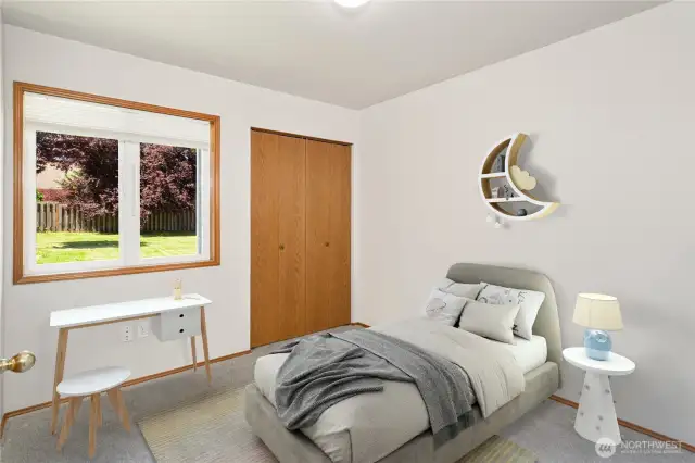 Bright and Cozy Third Bedroom – Ideal for Guests, Home Office, or Creative Space!  Photo is virtually staged. Carpet is new.