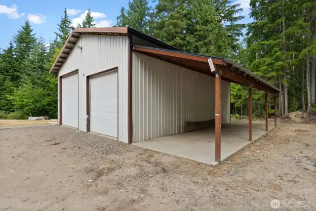 Large garage/shop w/ newer carport and patio