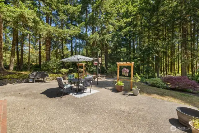 This sunny outdoor space invites you to slow down, stretch out, and savor the serenity of your own backyard.