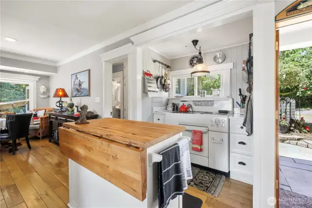 Butcher block island for food prep ease.