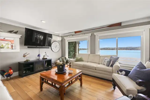 Notice the beautiful wide planked floors.
