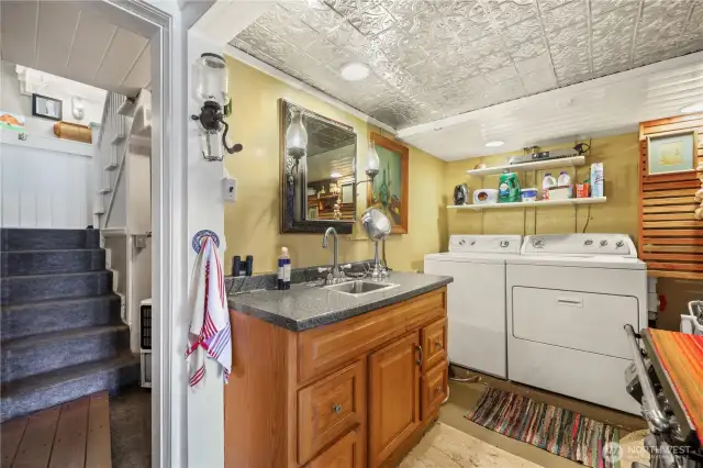 Lower level laundry room area.