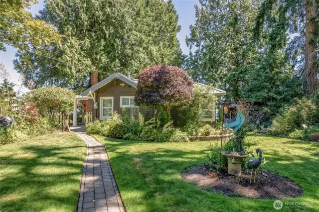 Nestled in a tranquil, park-like setting this property features beautifully manicured grounds framed by mature landscaping enabling you to enjoy the calm beauty of nature right at your door step.
