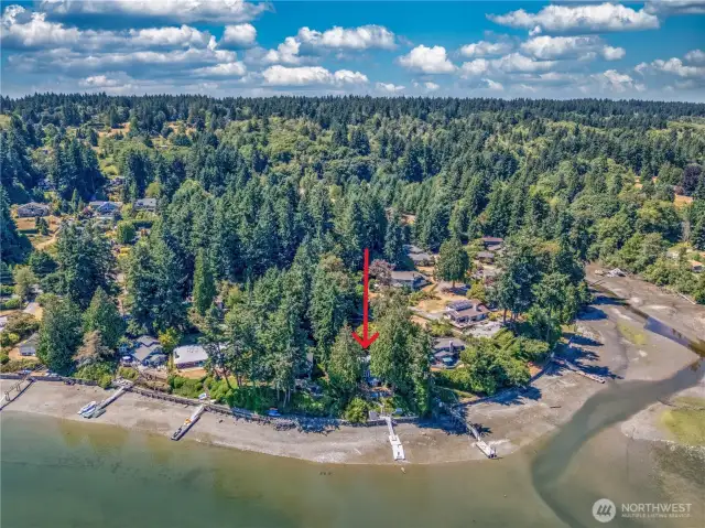 This charming waterfront home offers the perfect blend of comfort and beauty. Whether it's morning coffee with the sunrise or evenings by the water's edge, this home offers a simple, serene lifestyle in an unbeatable location.