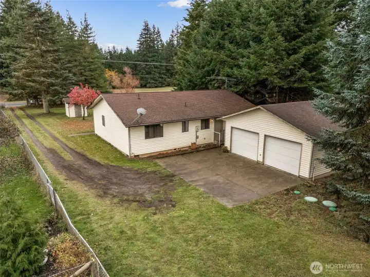 Ready for your vehicles and toys, the 576 sq/ft detached garage sits just steps from the easy entry into the large mudroom. Space for vehicles, reacretional gear, and room for a shop bench or other hobby equipment.
