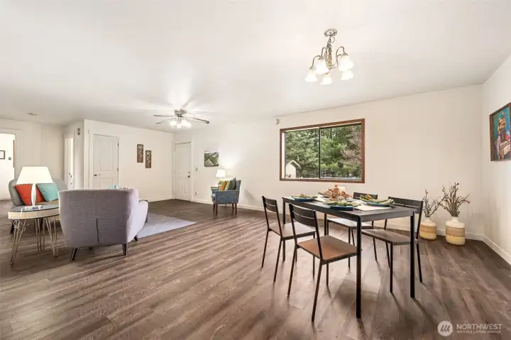 The floor plan forms an easy flow "L-shape" providing loads of options for a big farm table, sectional recliners, or your favorite antiques with plenty of wall space for a hutch or book case.