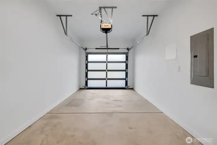 One car garage with EV charging.