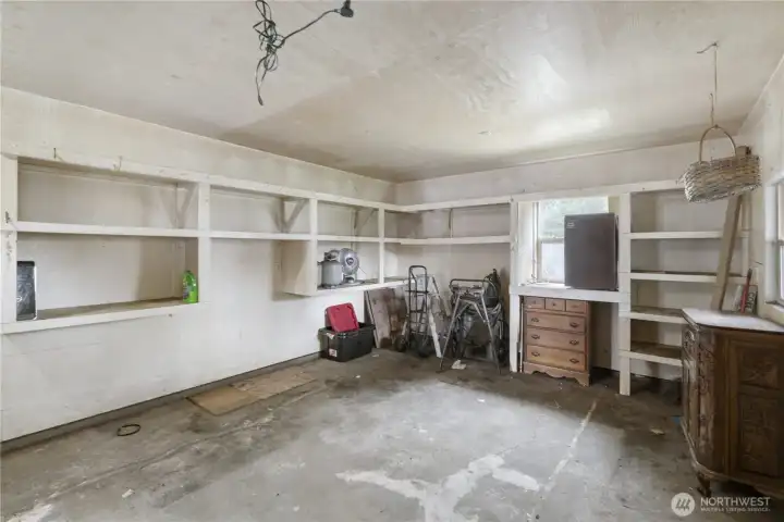 Many shelves waiting for you to use. Could be storage area for seasonal decorations, shelving for numerous storage bins or however it helps you the most.