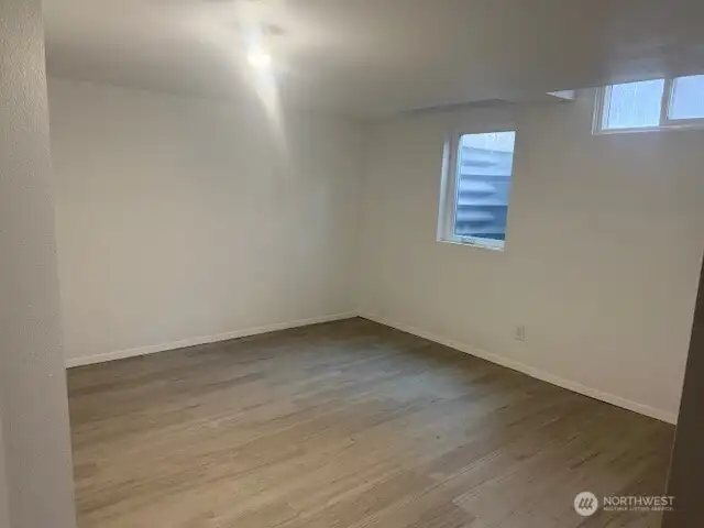 Bedroom 4 in basement with egress windows