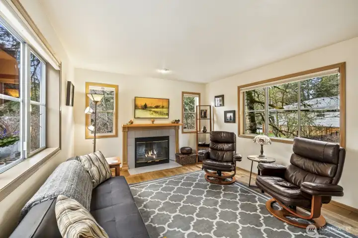 Abundant windows fill every space with year-round sunlight and serene treed views.