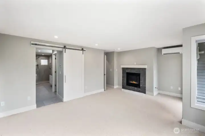 Primary Bedrooms Modern Barn Door Leading too the ensuite