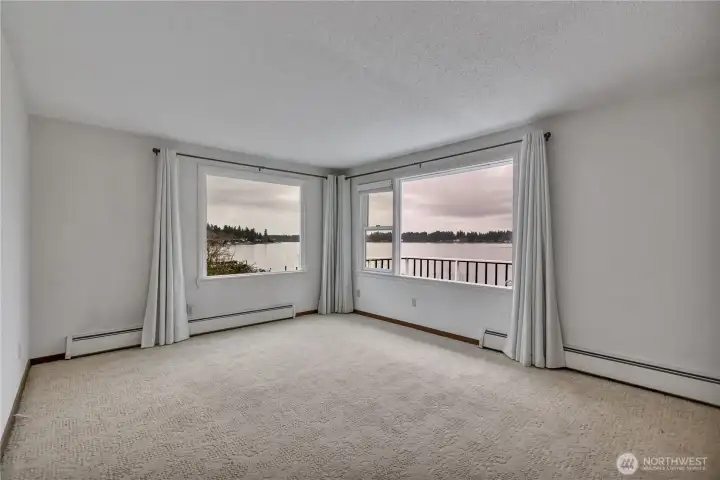 Main Home... family room with amazing views of Mt Rainier and the lake