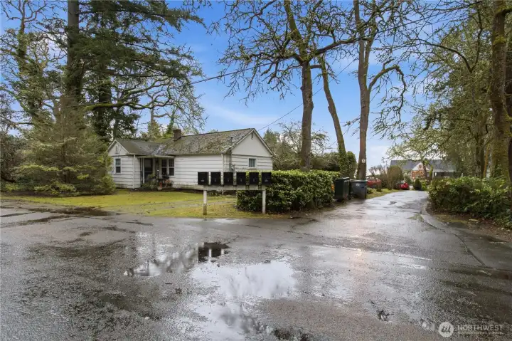 Street view of 2 BR, 1 BA 884 sq ft rental home at American Ave SW street side of the property