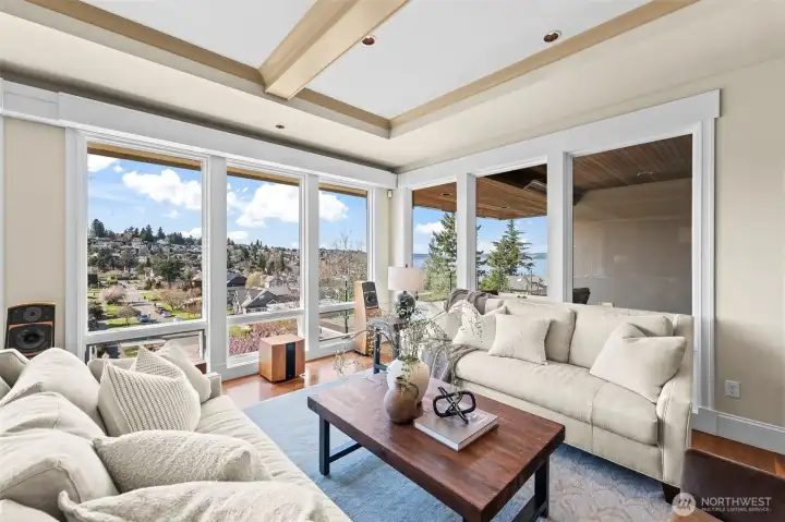 A breathtaking sanctuary of glass and light. The soaring windows frame the waterfront with such precision that every seat in the room is the best seat in the house.