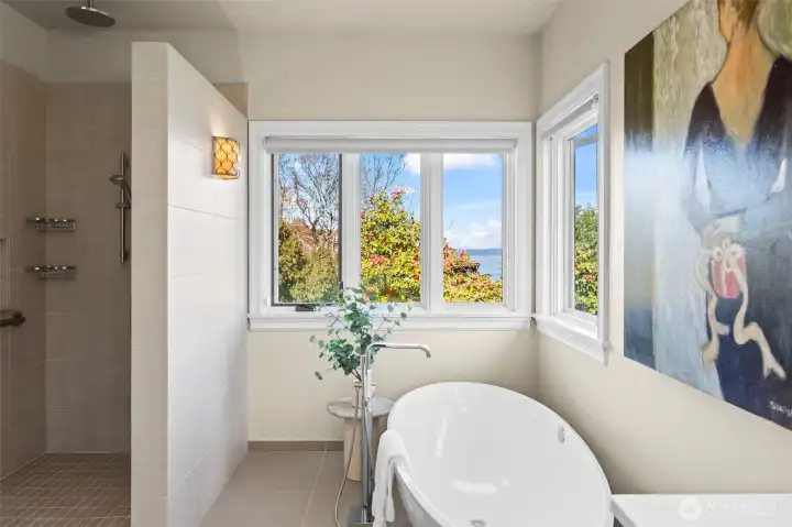 Where the city meets the sea. This spa-inspired retreat centers around a deep soaking tub, framed by expansive views that transform a daily routine into a world-class experience.