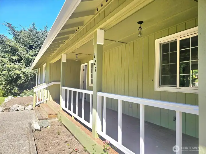 Covered front porch lined with flower beds waiting for your touch! Covered front porch lined with flower beds waiting for your touch!