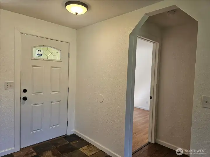 Entry-way with charming arched entry to the hall Entry-way with charming arched entry to the hall