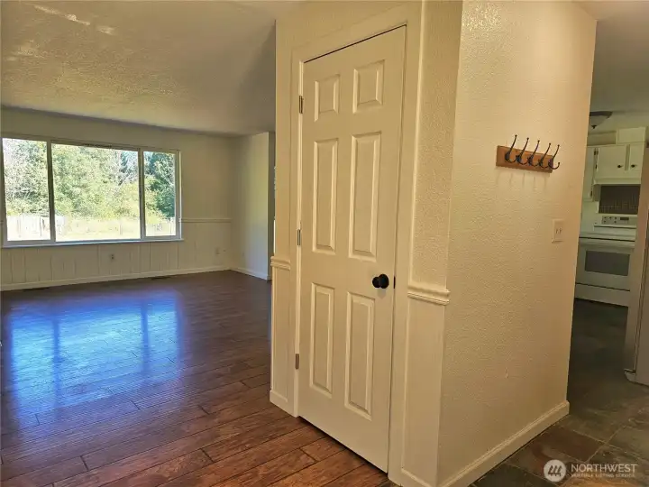 Entry way with slate floors and a coat closet Entry way with slate floors and a coat closet