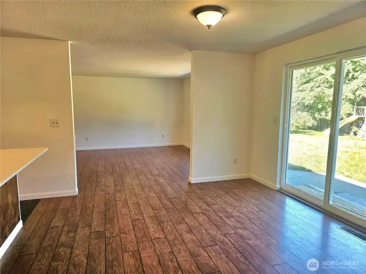 Dining/Family room flows into the Living room. Slider to back porch Dining/Family room flows into the Living room. Slider to back porch