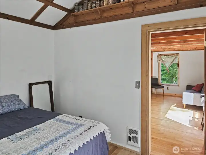 There is one bedroom connected to the main cabin.