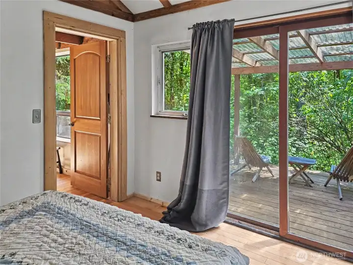 Sliding glass doors take you out to a small deck overlooking the creek.