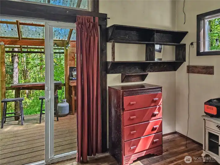 Step inside the sliding glass doors for a lovely private space to escape the hustle and bustle.