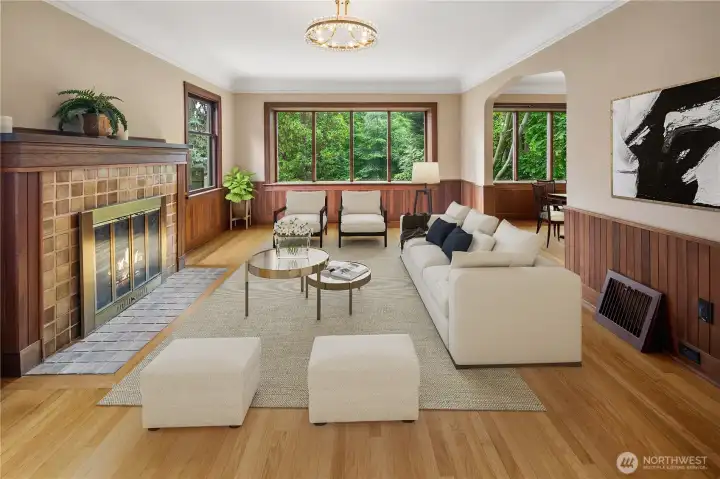 Virtually staged. The spacious main level offers a gracious living room with fireplace, formal dining room ideal for entertaining, functional kitchen, two comfortable bedrooms, and a full bath. Upstairs, you'll find two  generously sized bedrooms and a second bathroom, providing flexibility for guests, home offices, or growing households.