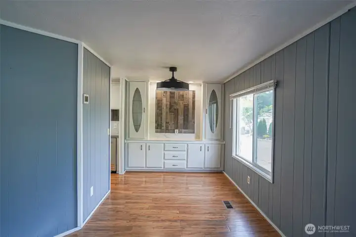 Dining room with built-in cabinets.