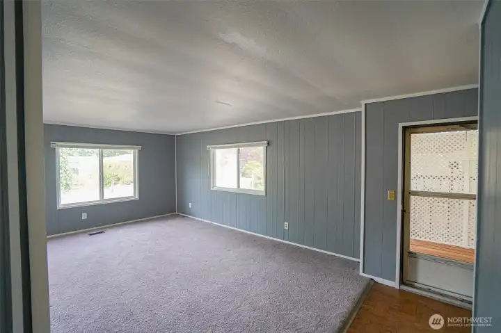 Living room and walkway to front deck.
