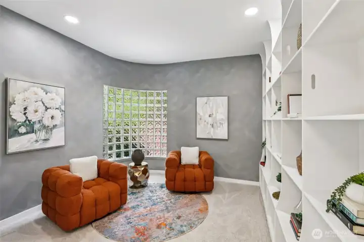 A separate sitting or family room offers flexible space for reading, relaxing or entertaining.