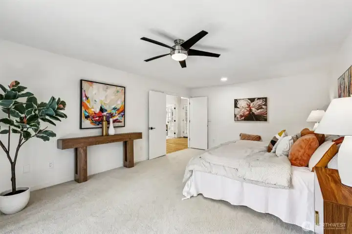 The primary bedroom offers exceptional space, natural light and a flexible furniture layout.