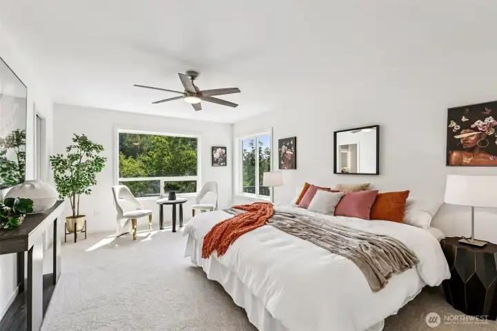 This oversized bedroom lives like a second primary, with abundant space and natural light.= and a walk-in closet.
