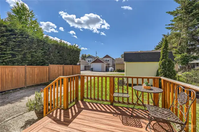 Sunny west facing deck in the back yard. Owners have often seen skydivers and hot air balloons from the deck.  Plenty of parking.  Partially fence yard.  Storage shed.