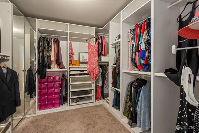 Large on-suite walk in with custom closet system