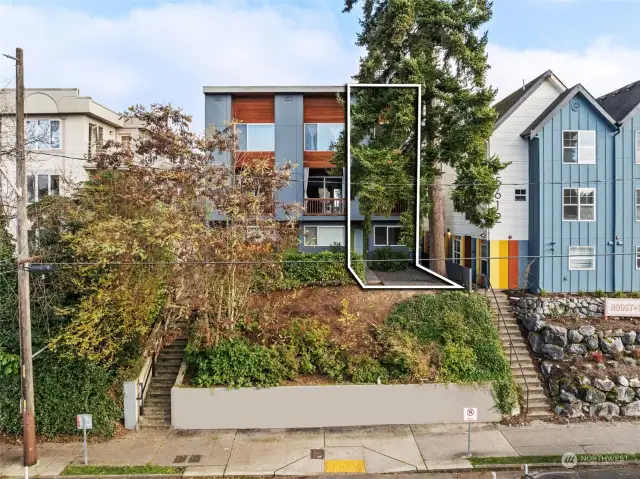 Home is nestled high above the street for privacy.