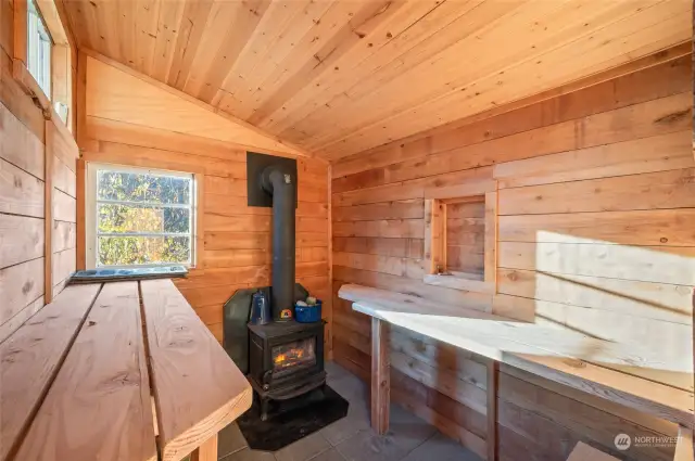 Outdoor energy efficient sauna operated with a woodstove! Private yet large enough to invite others!