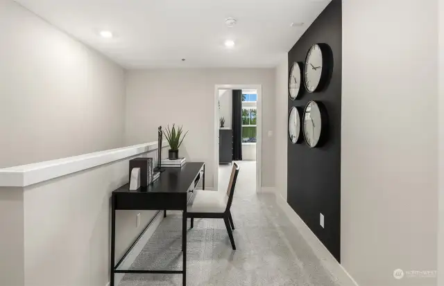 Loft between the primary and second bedroom perfect for a home office