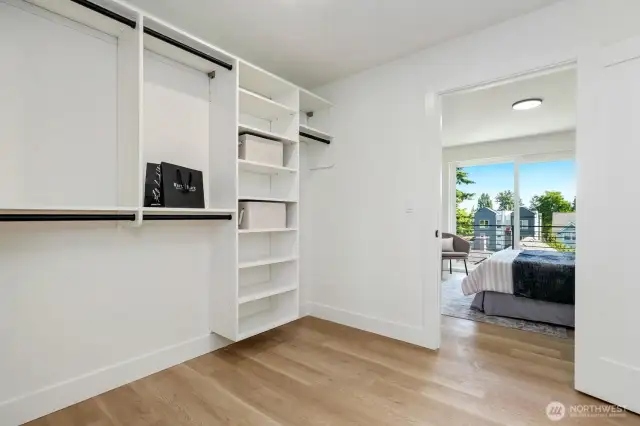 Stay organized with custom closet organizers in the primary closet. Maximize space and efficiency while keeping your wardrobe tidy and accessible.
