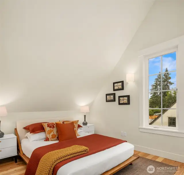 The second of two vaulted ceiling bedrooms on the third floor
