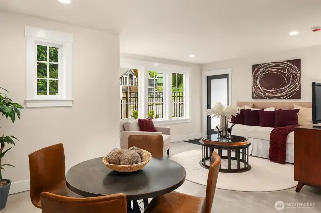 The sunny, south facing main floor includes studio/flex room with polished concrete floors, private entry and sunny south facing fenced yard.