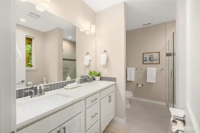 The five piece primary bathroom.