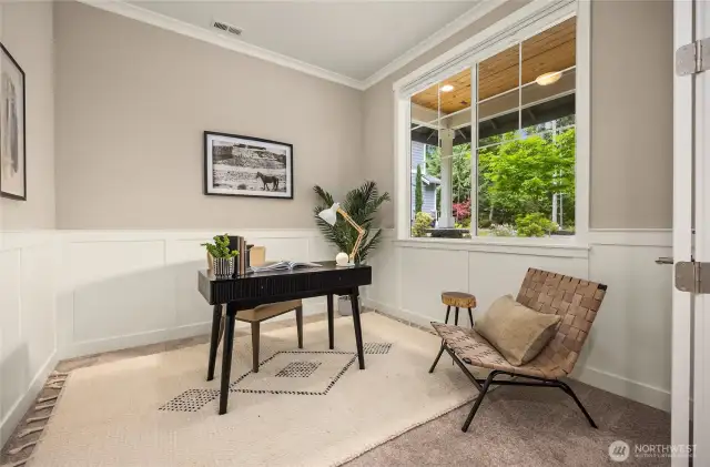 The front room is an office space overlooking the front yard.