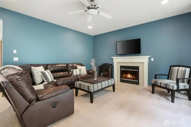 Formal living room with propane fireplace.