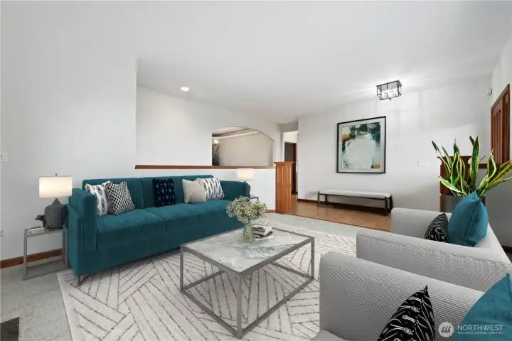 Formal living room with beautiful new carpet.  This photo is virtually staged.