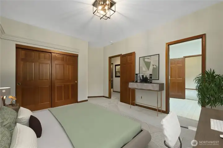 One of four bedrooms - this bedroom shares a Jack-n-Jill bathroom. This photo is virtually staged.