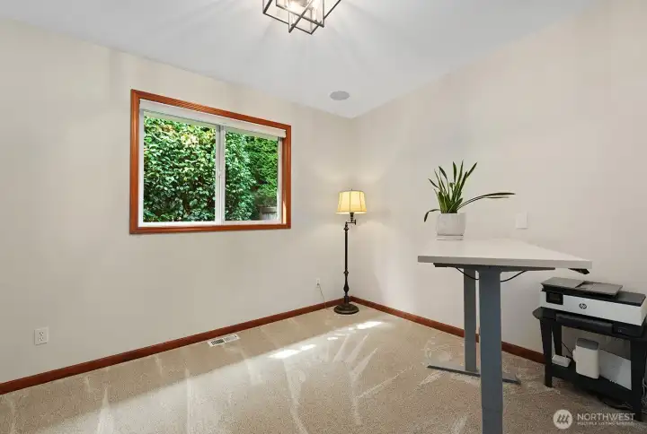 One of four bedrooms. This bedroom currently being used as an office.