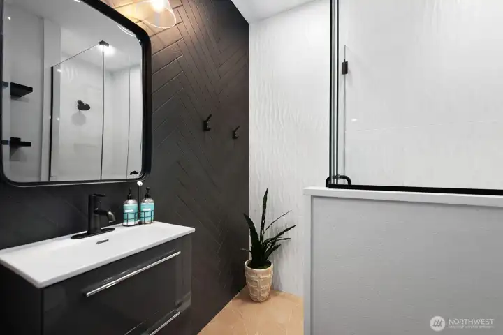Stunning remodeled 3/4 bathroom next to the 4th bedroom.