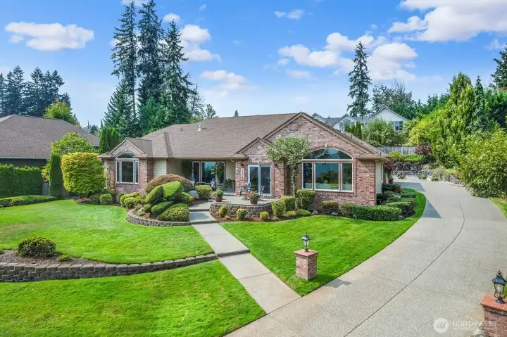 Private driveway to huge 3 car garage. And grand paved parking area for a motorhome with dedicated power.